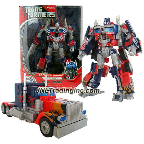 [Damage Box] Hasbro Year 2006 Series 1 Movie Leader Class 11 Inch Tall Electronic Robot Action Figure - OPTIMUS PRIME with Lights and Sounds Plus Flip Down Ion Blaster (Vehicle Mode: Rig Truck)